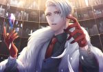  1boy crystal divus_crewel feathers fur_scarf gloves grey_eyes hand_up highres indoors kurosuke-s long_sleeves looking_at_viewer male_focus necktie parted_lips red_gloves red_neckwear shelf twisted_wonderland upper_body vest white_hair 