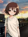  1girl absurdres blush brown_eyes brown_hair car closed_mouth cloud cloudy_sky ground_vehicle guard_rail head_tilt highres kill_me_baby looking_at_viewer motor_vehicle nadegata oribe_yasuna outdoors photo_background shirt short_hair short_sleeves sky smile solo standing sunset suspenders white_shirt 