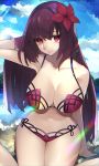  1girl absurdres alternate_costume bikini breasts cloud cloudy_sky commentary_request day fate/grand_order fate_(series) flower hair_intakes hair_ornament hand_in_hair hibiscus highres large_breasts legs_together ocean outdoors pink_bikini purple_bikini purple_hair red_eyes reirou_(chokoonnpu) scathach_(fate)_(all) scathach_(swimsuit_assassin)_(fate) sky smile solo swimsuit waving 