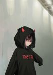  1girl absurdres black_hair black_hoodie closed_mouth clothes_writing highres hood hood_up horned_hood long_sleeves looking_at_viewer medium_hair nadegata original red_eyes sleeves_past_fingers sleeves_past_wrists solo upper_body 