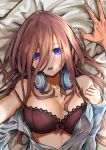  1boy 1girl blue_eyes blush bra breasts brown_bra brown_hair cleavage collarbone commentary_request go-toubun_no_hanayome hair_between_eyes headphones headphones_around_neck highres large_breasts long_hair lying miyaumiasataka nakano_miku on_back on_bed on_pillow open_clothes open_mouth open_shirt pov pov_hands solo_focus strap_slip underwear undressing upper_body 