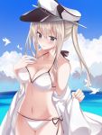  1girl bikini bird blonde_hair blue_sky breasts cleavage cloud cowboy_shot day fathom graf_zeppelin_(kantai_collection) grey_eyes groin hair_between_eyes hat highres horizon kantai_collection large_breasts long_hair looking_at_viewer military_hat ocean outdoors peaked_cap seagull side-tie_bikini sidelocks sky solo swimsuit twintails white_bikini white_headwear white_robe 