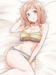  1girl :o absurdres bangs bare_legs bed bed_sheet between_legs bikini blush breasts brown_eyes cleavage collarbone from_above hair_over_shoulder hand_between_legs hand_in_hair highres idolmaster idolmaster_shiny_colors large_breasts light_brown_hair long_hair looking_at_viewer lying multicolored multicolored_bikini multicolored_clothes on_back on_bed open_mouth sakuragi_mano solo striped striped_bikini swimsuit tankini tokufumi 