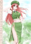  1girl bangs bosutonii braid crop_top day eyebrows_visible_through_hair floating_hair green_eyes green_headwear green_skirt grin hand_on_hip highres hong_meiling long_hair looking_at_viewer medium_skirt midriff navel outdoors parted_bangs red_hair shiny shiny_hair short_sleeves side_slit skirt smile solo standing stomach touhou twin_braids very_long_hair 