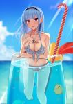  1girl :d air_bubble anchor_necklace arm_under_breasts azur_lane bangs bare_shoulders bikini black_hairband blue_sky blunt_bangs blurry blurry_background blush breasts bubble candy candy_cane cleavage cloud cocktail_glass collarbone commentary_request cup day dido_(azur_lane) drink drinking_glass earrings eyebrows_visible_through_hair food front-tie_bikini front-tie_top grey_bikini hairband hand_on_own_chest heart heart_earrings highres in_container in_cup jewelry lace-trimmed_hairband large_breasts light_rays long_hair looking_at_viewer manjuu_(azur_lane) midriff navel ocean open_mouth partially_submerged purple_eyes shaketarako sidelocks silver_hair sky smile solo_focus sunbeam sunlight swimsuit 