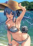  1girl ;d arm_up armpits bangle bikini blue_bikini blue_eyes blue_hair blush bracelet breasts cleavage collarbone eyebrows_visible_through_hair gotland_(kantai_collection) groin hair_between_eyes hat highres ichikawa_feesu jewelry kantai_collection leaning_forward long_hair looking_at_viewer medium_breasts mole mole_under_eye navel one_eye_closed open_mouth smile solo stomach straw_hat swimsuit thighs 