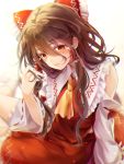  1girl ascot bow brown_hair commentary detached_sleeves hair_between_eyes hair_bow hair_tubes hakurei_reimu highres long_hair looking_at_viewer red_bow red_eyes solo touhou usotsuki_penta yellow_neckwear 