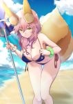  1girl :3 absurdres animal_ear_fluff animal_ears azami_masurao beach_umbrella bikini blue_bikini blush breasts cleavage collarbone eyebrows_visible_through_hair fate/extella fate/extra fate/grand_order fate_(series) fox_ears fox_girl fox_tail highres large_breasts looking_at_viewer navel ocean outdoors parasol pink_hair side-tie_bikini solo swimsuit tail tamamo_(fate)_(all) tamamo_no_mae_(swimsuit_lancer)_(fate) umbrella yellow_eyes 