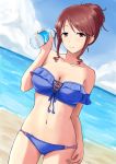  1girl 1mm_(norizo) alternate_hairstyle bare_shoulders beach bikini blue_bikini blue_sky blue_swimsuit blush bottle breasts brown_eyes brown_hair cleavage cloud cross-laced_bikini_top eyebrows_visible_through_hair frill_trim hair_bun hand_on_hip highres holding holding_bottle idolmaster idolmaster_cinderella_girls large_breasts light_blush looking_at_viewer mifune_miyu navel ocean sand sidelocks sky smile solo strapless strapless_bikini strapless_swimsuit swimsuit water water_bottle 