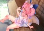 1girl animal_ear_fluff animal_ears blue_ribbon blush collarbone commentary eyebrows_visible_through_hair fate/extella fate/extra fate/grand_order fate_(series) food food_in_mouth fox_ears fox_girl fox_tail hair_ribbon ice looking_away pink_hair ribbon sweat tail tamamo_(fate)_(all) tamamo_no_mae_(fate) twintails wisespeak yellow_eyes younger 