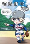  1girl baseball_cap baseball_mitt baseball_uniform blonde_hair blue_eyes blue_footwear blue_sky chinese_zodiac chunichi_dragons cloud cloudy_sky day girls_und_panzer grey_hat hat highres inoue_yoshihisa kneehighs long_sleeves nippon_professional_baseball open_mouth outdoors pointing shiny_clothes short_hair shorts sky socks solo speech_bubble sportswear translation_request white_shorts white_socks year_of_the_dragon youko_(girls_und_panzer) 