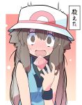  1girl @_@ black_wristband blue_shirt blush brown_eyes brown_hair condom condom_wrapper dropping flustered hat highres leaf_(pokemon) long_hair looking_at_viewer pokemon pokemon_frlg rascal_(feuille) shirt sleeveless sleeveless_shirt solo surprised translated white_hat 