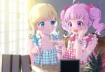  2girls :d ahoge aozora_himari applying_manicure blonde_hair blue_eyes blue_nails blurry blurry_foreground book bow bracelet closed_mouth commentary_request hair_bow hand_on_own_cheek hand_on_own_face highres himitsu_no_aipri holding holding_brush hoshikawa_mitsuki indoors jewelry long_hair looking_at_another moukinui multiple_girls nail_polish nail_polish_bottle nail_polish_brush open_mouth painting_fingernails pink_hair pretty_series purple_eyes smile table twintails upper_body 