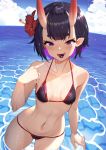  1girl bangs bare_shoulders bikini black_bikini blue_sky blush bob_cut breasts eyeliner fate/grand_order fate_(series) food fruit grapes highres horns looking_at_viewer makeup mouth_hold navel ocean oni oni_horns open_mouth pointy_ears purple_eyes purple_hair raijuu_(bakanara) short_eyebrows short_hair shuten_douji_(fate/grand_order) skin-covered_horns sky smile swimsuit teeth thighs wading wet 