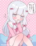  1girl :o ame_usako banned_artist blue_eyes blush bow commentary_request eromanga_sensei fang feet_out_of_frame frilled_shirt_collar frills hair_bow hand_up izumi_sagiri knees_together_feet_apart knees_up long_hair long_sleeves looking_at_viewer low-tied_long_hair parted_lips pink_background pink_bow pink_shirt pink_shorts polka_dot polka_dot_background shirt short_shorts shorts silver_hair sleeves_past_wrists solo tears translation_request twitter_username very_long_hair 