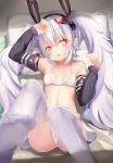  1girl :o animal_ears arm_up ass azur_lane bangs bare_shoulders bikini black_hairband black_sleeves breasts bunny_ears cameltoe commentary_request detached_sleeves eyebrows_visible_through_hair feet_out_of_frame hair_between_eyes hairband hand_up highres laffey_(azur_lane) long_hair long_sleeves looking_at_viewer lying na!?_(naxtuyasai) navel no_shoes on_back parted_lips pillow red_eyes retrofit_(azur_lane) silver_hair sleeves_past_wrists small_breasts soles solo swimsuit thighhighs twintails very_long_hair white_bikini white_legwear 