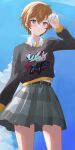  1girl arai_motoha ball belt black_belt black_sweater blue_eyes blue_sky brown_hair closed_mouth clothes_writing collared_shirt highres holding holding_ball konchi_(63438789) light_blush outdoors persona persona_5 persona_5:_the_phantom_x pleated_skirt shirt short_hair skirt sky solo sweater white_shirt 