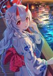  1girl alternate_costume blue_archive blue_hair blue_halo blue_kimono braid bridge chise_(blue_archive) commentary_request english_commentary fireworks flower gradient_horns hair_flower hair_ornament halo hand_on_railing hand_up highres horns japanese_clothes kimono light_blush long_hair looking_at_viewer looking_to_the_side low_twin_braids mixed-language_commentary multicolored_horns night obi oni open_mouth outdoors print_kimono railing red_eyes red_horns reflection reflective_water sash shrimp1634 skin-covered_horns smile solo twin_braids water yukata 