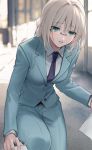  1girl an-94_(girls_frontline) aqua_eyes bangs belt blue_jacket blue_neckwear blue_pants blue_suit blurry blurry_background breasts collared_shirt commentary_request eyebrows_visible_through_hair formal girls_frontline glasses indoors jacket pants paper parted_lips partial_commentary picking_up platinum_blonde_hair shirt sidelocks squatting suit urano_ura white_shirt 