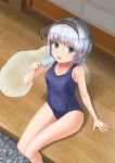  1girl food green_eyes hairband highres konpaku_youmu kubure popsicle school_swimsuit short_hair silver_hair solo swimsuit thighs touhou 