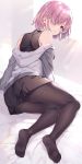  1girl arm_support artist_name backlighting bed bed_sheet black_legwear black_shirt black_skirt commentary fate/grand_order fate_(series) from_behind grey_shirt hair_over_one_eye highres hood hoodie indoors kuroki_(ma-na-tu) legs light_particles long_sleeves looking_at_viewer looking_back lying mash_kyrielight miniskirt off_shoulder on_bed on_side pantyhose parted_lips pillow pink_hair pleated_skirt purple_eyes shirt short_hair signature skirt sleeveless sleeveless_shirt solo window 