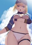  1girl ahoge artoria_pendragon_(all) ashino_moto bangs baseball_cap bikini blonde_hair blue_eyes blue_headwear blue_jacket blue_sky blush breasts cleavage cropped_jacket fate/grand_order fate_(series) hair_between_eyes hair_through_headwear hat highres jacket long_hair looking_at_viewer medium_breasts mysterious_heroine_xx_(foreigner) navel open_mouth ponytail shrug_(clothing) sidelocks sky swimsuit thigh_strap white_bikini 