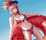  1girl american_flag_bikini applekun bangs baseball_cap bikini blue_eyes blue_sky breasts closed_mouth commentary day dutch_angle fate/grand_order fate_(series) flag_print front-tie_bikini front-tie_top groin hat holding holding_innertube innertube long_hair looking_at_viewer medium_breasts miyamoto_musashi_(fate) miyamoto_musashi_(swimsuit_berserker)_(fate) multicolored_bikini multicolored_clothes multicolored_headwear navel one_eye_closed outdoors pink_hair ponytail sky smile solo standing stomach swept_bangs swimsuit 
