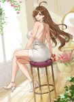  1girl ahoge ass back bangs bare_shoulders blush breasts brown_eyes brown_hair cross cross_earrings dress earrings flower hair_over_one_eye high_heels highres jewelry kono_subarashii_sekai_ni_shukufuku_wo! large_breasts legs long_hair looking_at_viewer looking_back mirror open_mouth sendrawz sitting smile stool white_dress wiz_(konosuba) 