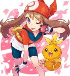  1girl bandana bike_shorts bike_shorts_under_shorts blue_eyes blush breasts brown_hair closed_mouth commentary_request cyaneko fanny_pack gloves holding holding_poke_ball leaning_forward looking_at_viewer may_(pokemon) medium_breasts one_eye_closed open_mouth poke_ball poke_ball_(basic) pokemon pokemon_(creature) pokemon_ruby/sapphire/emerald red_bandana red_shirt shirt shorts shorts_under_shorts smile tongue tongue_out 