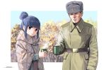  1boy 1girl belt blanket blue_hair border closed_mouth coat collared_coat cup dated forest fur_hat green_coat hair_bun hammer_and_sickle hat holding holding_cup horikou long_sleeves looking_at_viewer military_coat mug nature purple_eyes real_life shima_rin signature smile soldier soviet_army ushanka white_border yurucamp 