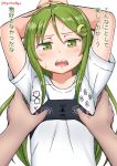  1girl 1other arms_up commentary_request crescent crescent_hair_ornament dualsense flat_chest green_eyes green_hair hair_ornament highres kantai_collection long_hair looking_at_viewer nagatsuki_(kantai_collection) nipple_press onguuchi playstation_controller shirt simple_background t-shirt translation_request upper_body white_background 