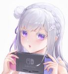  1girl :o absurdres bangs bare_shoulders blush braid commentary_request crown_braid emilia_(re:zero) eyebrows_visible_through_hair face flower french_braid hair_flower hair_ornament hair_ribbon handheld_game_console hands_up highres holding holding_handheld_game_console long_hair looking_at_viewer naclscarlet nintendo_switch open_mouth pointy_ears purple_eyes purple_ribbon re:zero_kara_hajimeru_isekai_seikatsu ribbon silver_hair simple_background solo upper_body white_flower 