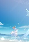  1girl :d absurdres animal bird blue_sandals blue_sky blurry blurry_foreground brown_hair cac_itinose cloud commentary_request day depth_of_field dress grey_eyes highres long_hair long_sleeves ocean original outdoors pantyhose sandals sky smile solo standing standing_on_one_leg white_dress white_pantyhose 