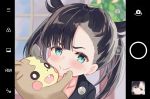  1girl :d black_hair black_jacket blurry blurry_background blush cellphone_picture closed_mouth commentary_request depth_of_field dress forced_smile gen_8_pokemon green_eyes jacket looking_at_viewer marnie_(pokemon) mimikaki_(men_bow) morpeko morpeko_(full) open_mouth pink_dress pokemon pokemon_(creature) pokemon_(game) pokemon_swsh smile twintails upper_body 