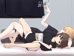  2girls arm_pillow barefoot bed black_shirt black_shorts blonde_hair breasts brown_eyes brown_hair closed_mouth commentary_request curtains hand_in_another's_hair highres holographic_interface interlocked_legs iwoillust large_breasts lying maribel_hearn midriff multiple_girls navel on_back open_mouth parted_lips pillow purple_eyes purple_shorts shirt short_sleeves shorts touhou usami_renko yellow_eye 