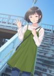  1girl black_hair bob_cut dress dutch_angle green_dress grey_eyes hair_ornament hairclip hand_up highres kyak_bamboo looking_at_viewer original outdoors overpass short_hair smile solo stairs 