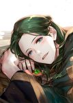  1boy blue_eyes blush book book_stack clover danhu fire_emblem fire_emblem:_three_houses forehead green_hair green_robe hair_bun leaning_on_object linhardt_von_hevring long_hair long_sleeves looking_at_viewer male_focus open_mouth signature simple_background smile solo upper_body white_background 