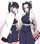  2girls :d akitokage01 bangs belt belt_buckle black_hair black_jacket black_pants breasts buckle butterfly_hair_ornament closed_mouth commentary_request cowboy_shot feet_out_of_frame gradient_hair hair_ornament haori highres jacket japanese_clothes kimetsu_no_yaiba kochou_shinobu large_breasts long_sleeves looking_at_viewer multicolored_hair multiple_girls open_mouth pants parted_bangs pleated_skirt purple_eyes purple_hair short_hair side_ponytail simple_background skirt smile standing tsuyuri_kanao white_background white_belt 