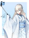  1girl absurdly_long_hair anastasia_(fate) blue_background blue_eyes blue_hairband blue_kimono blush border cellphone fate/grand_order fate_(series) grey_hair hair_ornament hair_over_one_eye hairband halloween_costume highres japanese_clothes kimono long_hair obi phone print_kimono sash selfie_stick signature sleeves_past_wrists smartphone smile snowflake_hair_ornament snowflake_print solo toni_nguyen very_long_hair w white_border wide_sleeves 