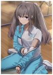  1girl bandages bandaid blush breasts grey_hair gym_uniform highres idolmaster idolmaster_shiny_colors indoors jersey long_hair medium_breasts noeru pants purple_eyes see-through seiza shirt shoes sidelocks sitting smile socks solo sweatpants twintails white_shirt yuukoku_kiriko 