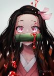  1girl artist_name bamboo bit_gag blood blood_drip blurry_foreground brown_hair cluseller collarbone commentary_request flat_chest forehead gag gagged gradient_hair grey_background hair_ribbon haori highres japanese_clothes kamado_nezuko kimetsu_no_yaiba kimono long_hair looking_at_viewer multicolored_hair orange_hair pink_eyes pink_kimono pink_ribbon ribbon simple_background solo two-tone_hair upper_body watermark 