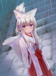  1girl absurdres animal_ear_fluff animal_ears arms_behind_back bangs blush closed_mouth commentary_request crying crying_with_eyes_open eyebrows_visible_through_hair folded_ponytail fox_ears fox_girl fox_tail hair_between_eyes hair_ribbon hakama highres iroha_(iroha_matsurika) japanese_clothes kimono long_sleeves looking_at_viewer miko original outdoors pink_ribbon purple_eyes rain red_hakama ribbon silver_hair solo stairs stone_stairs tail tears wet_kimono white_kimono 