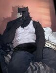 2025 absurd_res anthro arm_tuft beard bed bed_sheet bedding belly_hair biceps black_briefs black_clothing black_hair black_underwear blue_eyes blue_sclera body_hair bottomwear bottomwear_down briefs bulge cellphone clothed clothing deltoids dreff electronics facial_hair facial_tuft felid feline forearm_muscles furniture hair hand_on_crotch hi_res holding_cellphone holding_object holding_phone holding_smartphone looking_at_viewer male mammal manly muscular_legs mustache neck_tuft on_bed pants pants_down partially_clothed pecs phone pillow pubes reclining shadow shirt shoulder_tuft smartphone smile snaggle_tooth solo taking_picture taking_selfie tank_top topwear triceps tuft underwear white_clothing white_shirt white_tank_top white_topwear