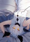  1004908751 1girl absurdres animal_ears arknights bangs bed_sheet dress eyebrows_visible_through_hair highres long_hair looking_at_viewer lying on_back orange_eyes owl_ears ptilopsis_(arknights) silver_hair sleeveless solo upside-down white_dress 