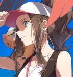  1girl baseball_cap blue_background blurry brown_hair brown_vest closed_mouth collarbone commentary_request eyelashes gen_5_pokemon green_eyes hand_on_headwear hand_up hat high_ponytail highres hilda_(pokemon) long_hair on_shoulder pokemon pokemon_(creature) pokemon_(game) pokemon_bw pokemon_on_shoulder shirt sidelocks sleeveless sleeveless_shirt starter_pokemon tepig vest white_shirt zattape 