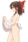  1girl apron apron_lift bare_arms bare_shoulders black_hair blush bow breasts brown_eyes clenched_teeth commentary_request ear_blush embarrassed from_side hair_bow hair_tubes hakurei_reimu highres large_bow medium_hair miyo_(ranthath) naked_apron red_bow simple_background small_breasts solo sweat teeth touhou white_apron white_background 