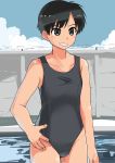  1girl absurdres bangs black_eyes black_hair black_swimsuit blue_sky cloud cloudy_sky commentary cowboy_shot day grin haida_katsuretsu hand_on_hip highres looking_to_the_side one-piece_swimsuit original outdoors school_swimsuit short_hair sky smile solo standing swimsuit tomboy 