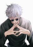  1boy black_jacket blue_eyes fingers_together gojou_satoru grin hair_between_eyes hands_up highres jacket jujutsu_kaisen long_sleeves looking_at_viewer male_focus one_eye_closed protected_link round_eyewear short_hair simple_background smile solo sunglasses upper_body white_background white_hair yorunaku 