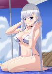  1girl azur_lane basket beach beach_umbrella belfast_(azur_lane) blue_eyes blush bracelet breasts chinese_commentary choker cloud cloudy_sky commentary_request eyebrows_visible_through_hair feet highres jewelry large_breasts lemon_kele long_hair looking_at_viewer navel ocean silver_hair sky smile solo swimsuit towel umbrella 