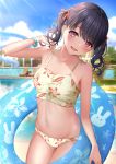  1girl :d bare_arms bare_shoulders bikini black_hair blurry blurry_background blush breasts brown_bikini collarbone commentary_request day depth_of_field floral_print fukumaru_koito hair_ribbon halter_top halterneck hand_up head_tilt highres idolmaster idolmaster_shiny_colors innertube karu_(qqqtyann) looking_at_viewer navel open_mouth orange_ribbon outdoors print_bikini purple_eyes ribbon small_breasts smile solo standing striped striped_ribbon swimsuit twintails 